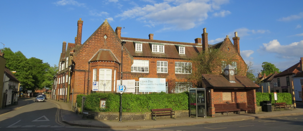 A brick school building in the sun